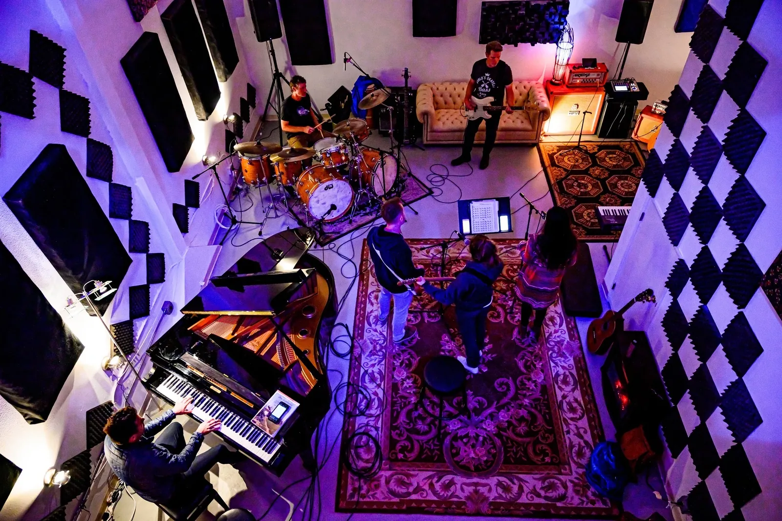 A student band tracking together in the Detar live room
