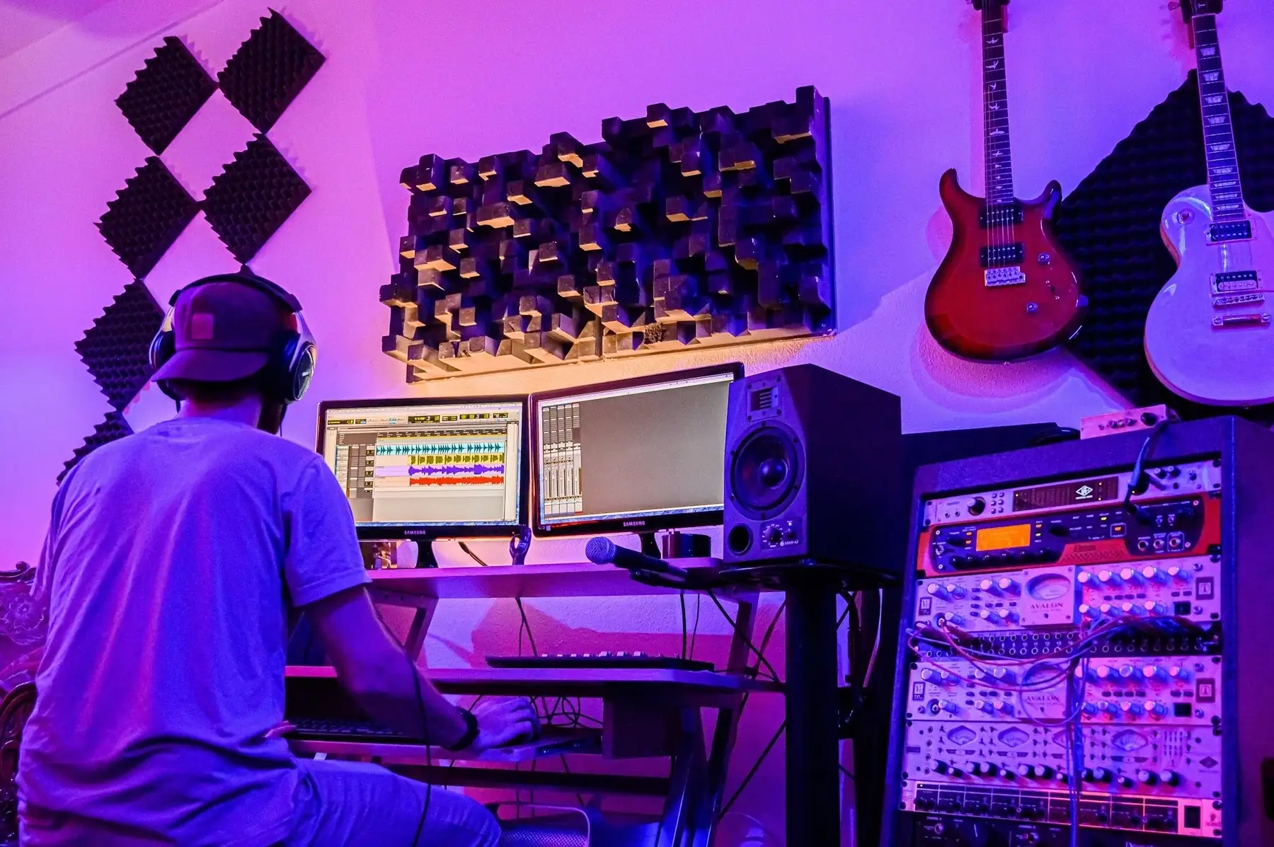 Engineer mixing at the studio console